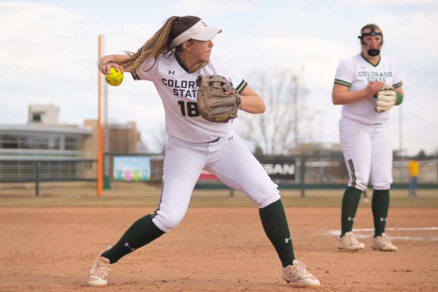 Ashley Ruiz (18) throws the ball to first base during Colorado State Universitys second game against Purdue University at the Colorado State Classic Softball tournament on March 8, 2020. The Rams win 4-3. 