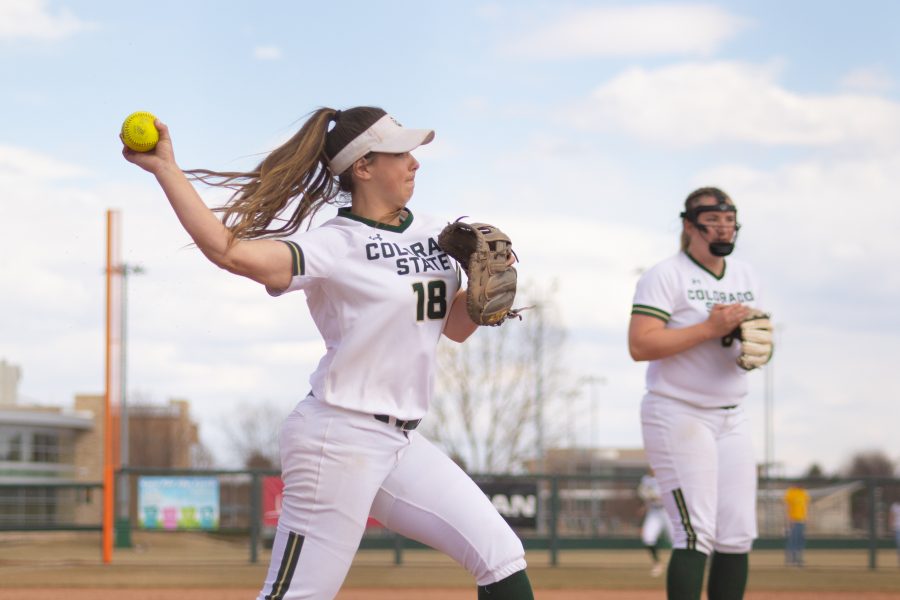 Ashley Ruiz (18) throws the ball to first base, during the Universitys second game against Purdue University at the Colorado State Classic Softball tournament on Mar, 8, 2020. The Rams win 4-3. (Devin Cornelius | Collegian)