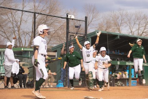 The Colorado State team celebrates after a home run, during the Universitys second game against Purdue University at the Colorado State classic softball tournament on Mar. 8, 2020. CSU wins 4-3. (Devin Cornelius | Collegian)
