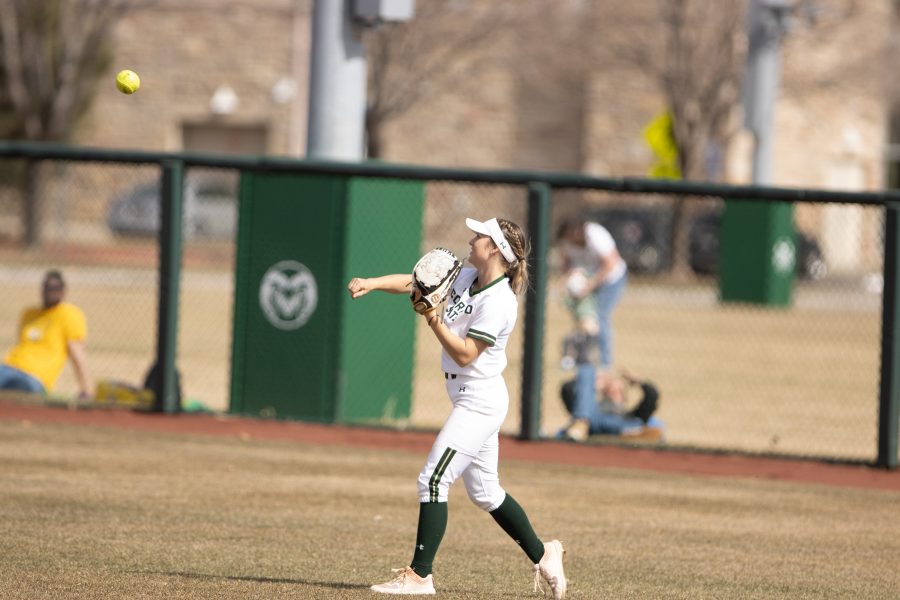 Tara Shadowen (11) throws the ball towards third base, during the University's second game against Purdue University at the Colorado State classic softball on Mar. 8, 2020. CSU wins 4-3. (Devin Cornelius | Collegian)