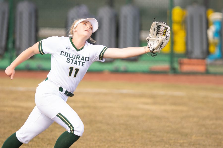 Tata Shadowen (11) reaches out for the ball, during the Universitys second home game vs Purdue University at the Colorado State classic softball tournament on Mar. 8, 2020. CSU wins 4-3. (Devin Cornelius | Collegian)