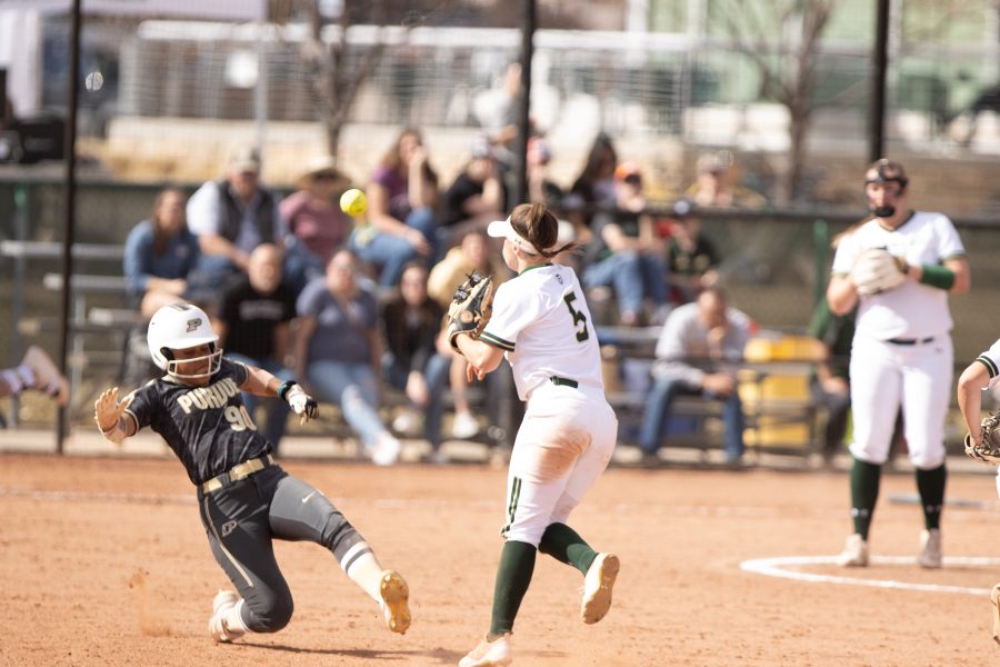 Haley Donaldson (5) gets an opponent out at second base and makes a throw to first, during the University's second   home game vs Purdue University at the Colorado State Classic softball tournament on  Mar. 8, 2020. CSU wins 4-3. (Devin Cornelius | Collegian)