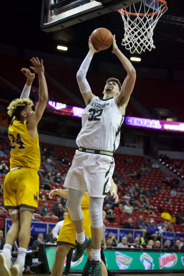 Nico Carvacho (32) goes up for a shot on March 4 at the Mountain West Conference Championship in Las Vegas, Nevada. Although a close game at times, the Rams lost to the Cowboys 80-74. (Ryan Schmidt | The Collegian)
