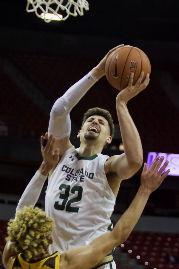 Nico Carvacho shoots on March 4. Although a close game, the Rams lost to the Cowboys 80-74. (Ryan Schmidt | The Collegian)