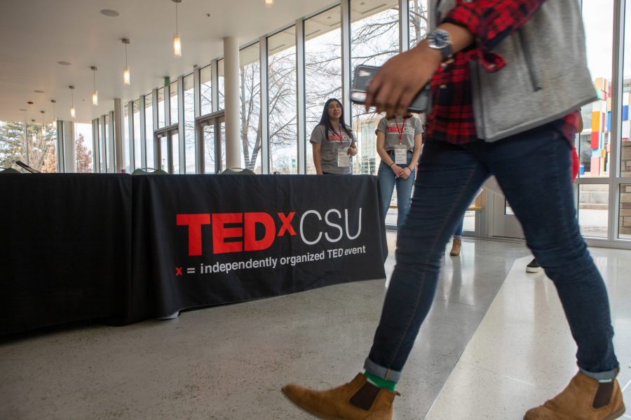 A visitor enters the Lory Student Center Theatre for the 2020 TEDxCSU event March, 8, 2020. TEDx is a community-organized gathering of people who give TED Talk-like speeches and performances around central ideas. The 2020 TEDxCSU event organized around the theme Momentum and featured key speakers, performers and poets in the Fort Collins community. 