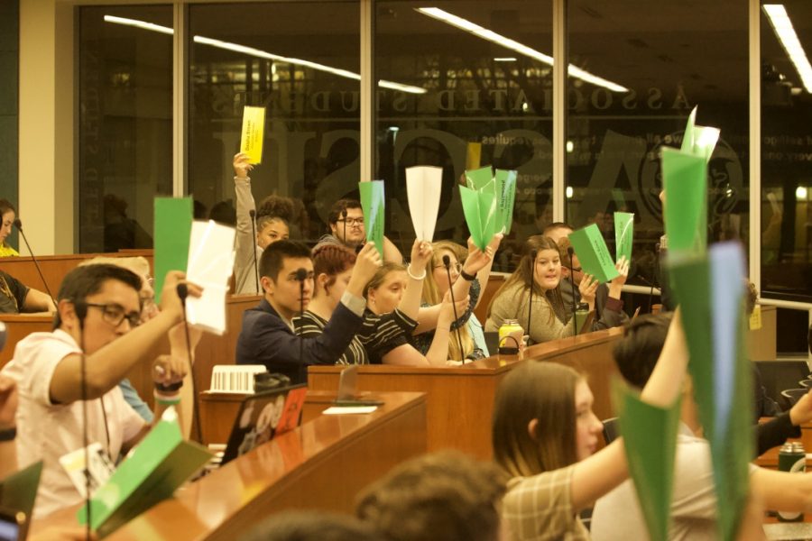 Senators vote during the Associated Students of Colorado State University meeting on March 4, 2020. (Ian Fuster | The Collegian)