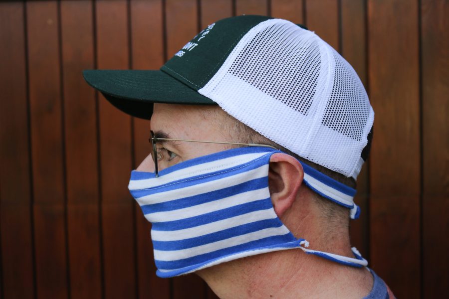 Man wears a DIY mask made from an old T-shirt. (Photo illustration by Anna von Pechmann | The Collegian) 