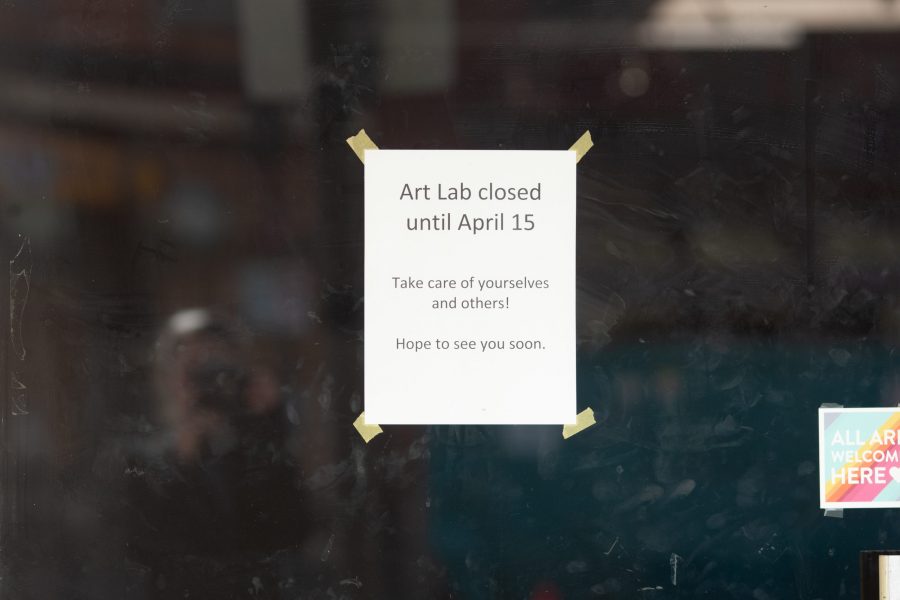 A closed notice hangs on the window of the Art Lab in downtown Fort Collins, similar to signs in most other downtown business windows. Effective March 26, Larimer County Public Health Director Tom Gonzales issued a Stay at Home order requiring all individuals in Larimer County to stay at home except for food and essential services. There are currently 127 confirmed-positive cases of COVID-19 in Larimer County, and five confirmed deaths. (Brooke Buchan | The Collegian) 