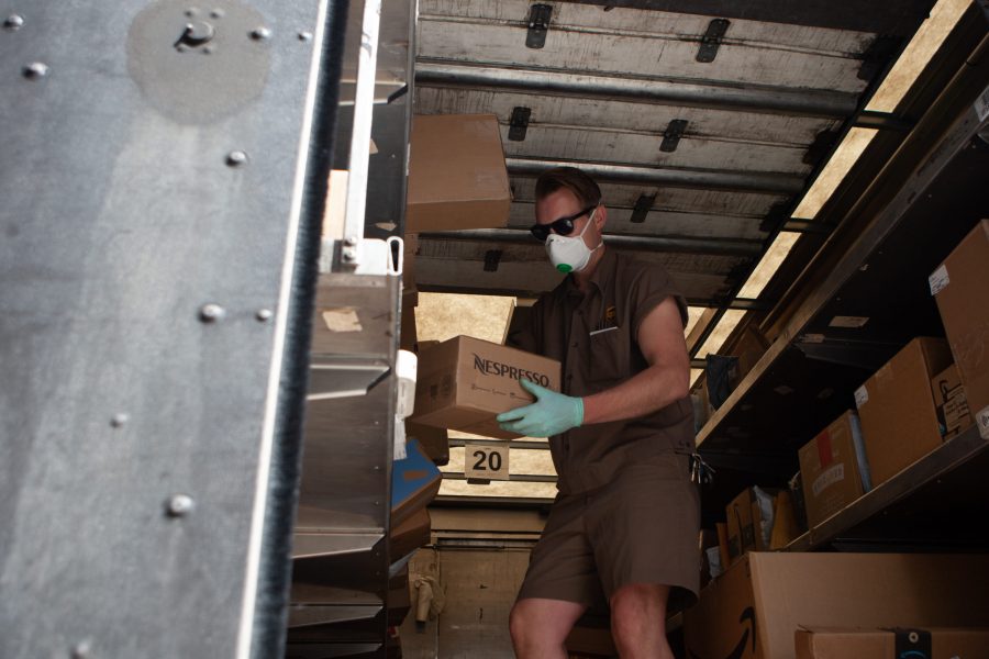 UPS provider Jesse Weber makes the daily route, delivering packages to people and businesses in Downtown Fort Collins. Weber received gloves after delivering to a dentist and received the mask from a woodworker. Im bringing people toilet paper, antibacterial wipes, dog food, Comcast, making it happen, Weber said. Because, you know, a lot of people cant leave their house.  (Brooke Buchan | The Collegian)