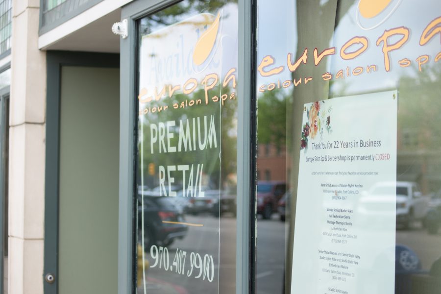 A sign on the Europe Salon Spa & Barbershop thanks the people for their business and states that it is permanently closed. Although restaurants have been cleared to re-open, bars and other places have yet to recieve the greenlight to open. (Devin Cornelius | Collegian)