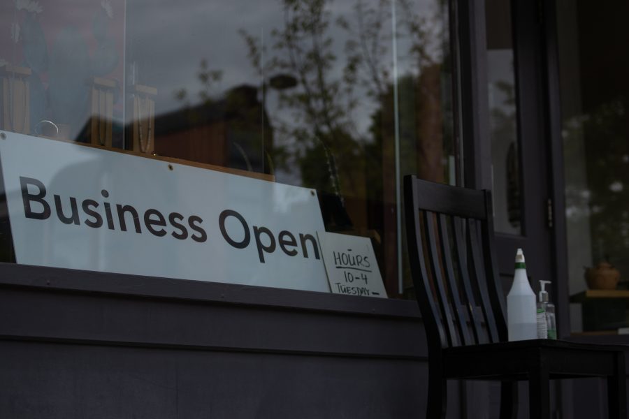 Meanwhile Back At The Ranch, a store in Fort Collins displays an open for business sign. Restaurants in Larimer County have been given permission to re-open dine-in services thanks to a variance approval.   (Devin Cornelius | The Collegian)