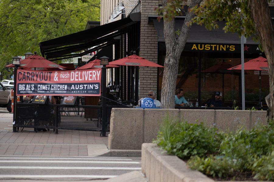 People dine-in at Austin's American Grill in Old Town, after a variance was approved allowing Larimer County restaurants to re-open dine-in service at limited capacities. (Devin Cornelius | Collegian)