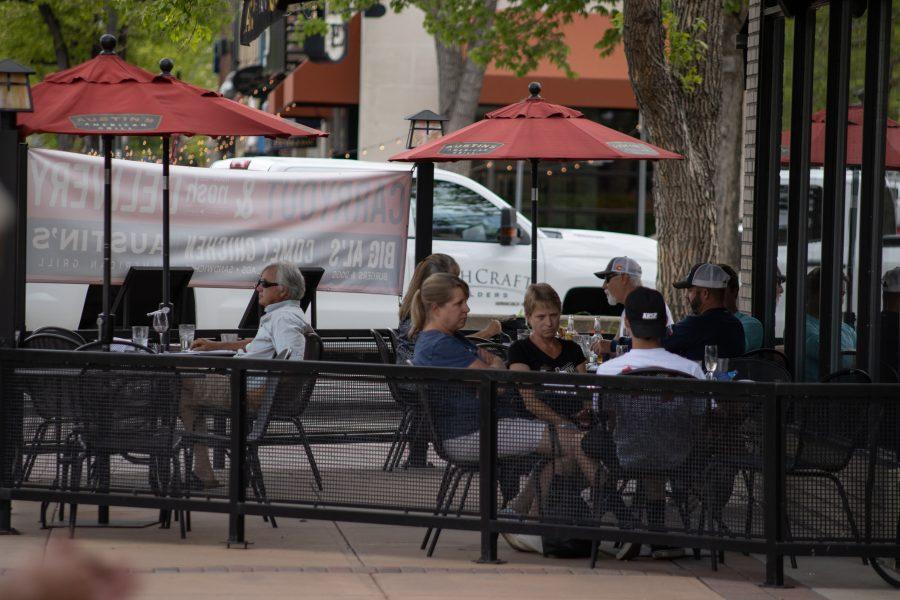 People dine-in at Austin's American Grill in Old Town, after a variance was approved allowing Larimer County restaurants to re-open dine-in service at limited capacities. (Devin Cornelius | Collegian)