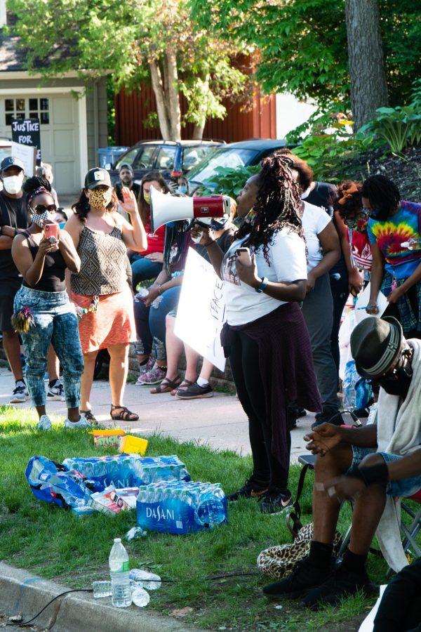 A political organizer making a speech calling on white allies to speak up more after calling out white silence and complacency. The peaceful protest was outside Hennepin County Attorney Mike Freemans house in response to the killing of George Floyd, May 28. (Ben Leonard | The Collegian)