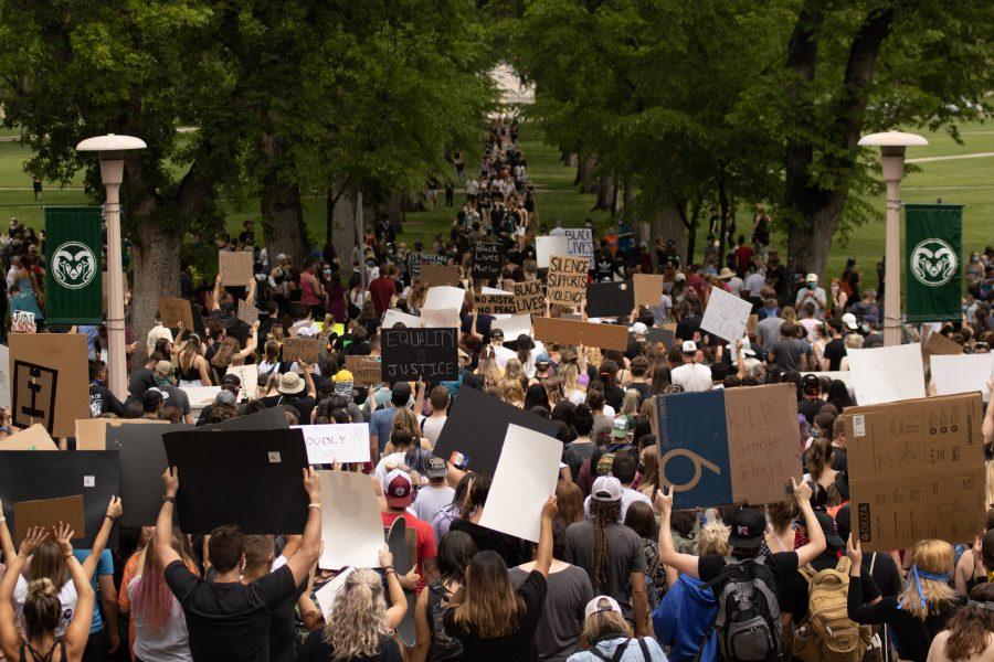Protesters leave the Administration Building and The Oval at Colorado State University as they march toward City Hall on June 2. (Devin Cornelius | The Collegian)