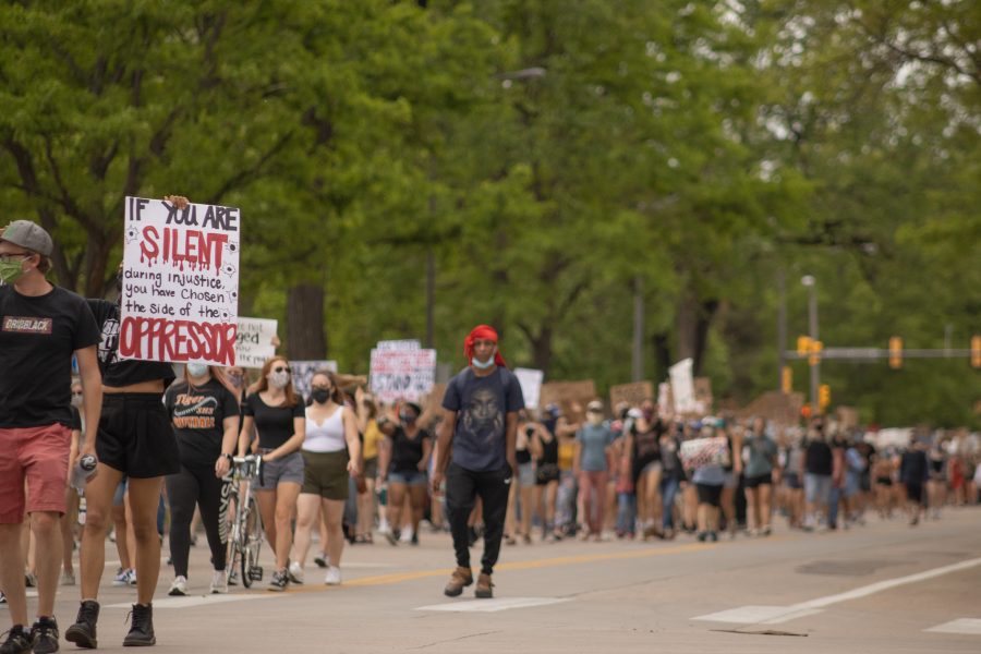 Protesters chant while they march down Howes Street towards City Hall on June 2. (Devin Cornelius | The Collegian)