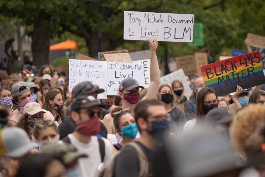 Hundreds of protesters stand in Old Town Square to protest police brutality, and that Black Lives Matter on June 5, 2020.
(Devin Cornelius | Collegian)
