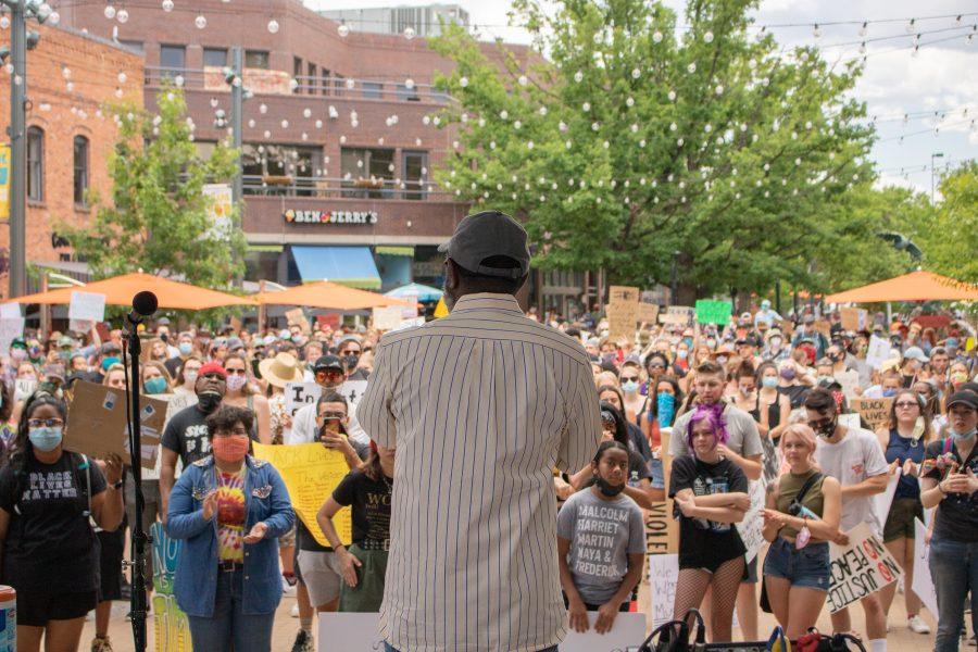 A man speaks to a crowd of protesters in 
Old Town Square on June 5. (Devin Cornelius | The Collegian)