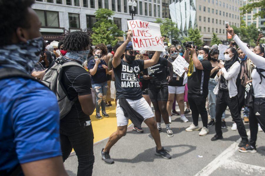 Protesters gather in a circle to dance to music playing through speakers outside Lafayette Square in Washington D.C. June 6, 2020. (Lucy Morantz | The Collegian)