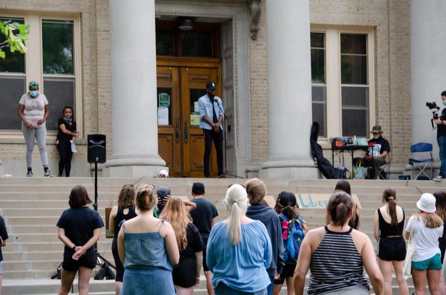 Julius Philpot speaks to the crowd of protestors at the Rally of Resistance on July 4. (Reed Slater | Collegian)