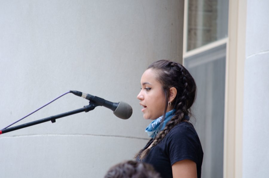 Ciara Wilson speaks to the crowd at the Administration Building. (Reed Slater | Collegian)
