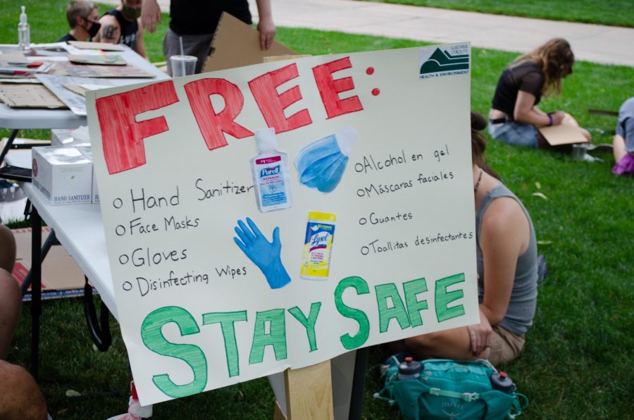 Rally organizers provided PPE and disinfectant at the protest at The Oval on July 4. (Reed Slater | Collegian)
