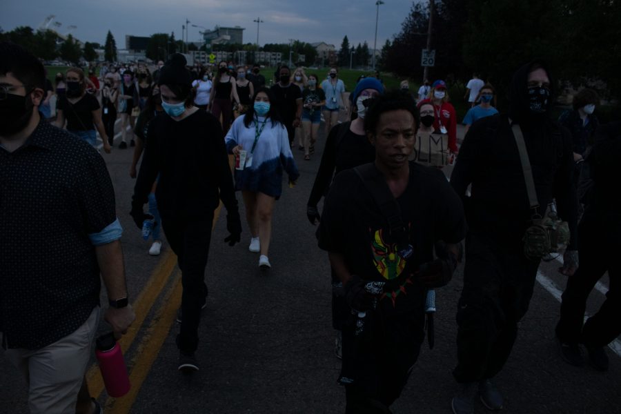 Protestors march through campus towards W Laurel St. Aug. 26. The protest was organized in response to the death of Jacob Blake, who was shot by a police officer in Kenosha, Wisconsin Aug. 23. (Anna von Pechmann | The Collegian) 