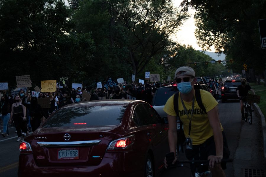 Protestors march on W Laurel Street from The Oval to the Colorado State University Police Department building back to The Oval Aug. 26. The protest was organized in response to the death of Jacob Blake, who was shot by a police officer in Kenosha, Wisconsin Aug. 23. (Anna von Pechmann | The Collegian) 
