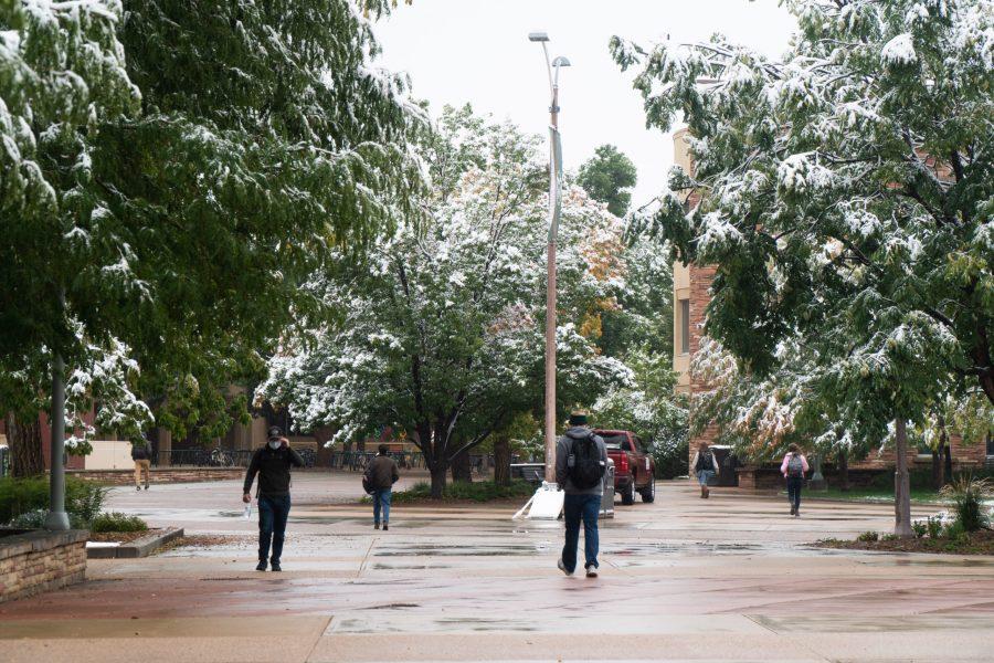Students in the snow draped plaza from the winter storm. (Ben Leonard | The Collegian)