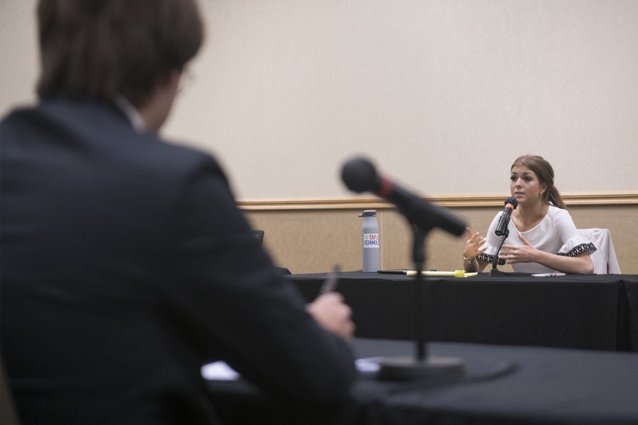 Associated Students of Colorado State University presidential candidate Hannah Taylor responds to a question asked by the debate moderator. (Lucy Morantz | The Collegian)