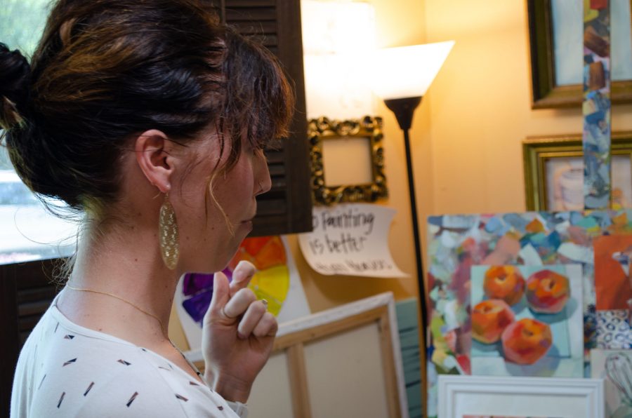 Parker looking on at her work space. (Reed Slater | Collegian)