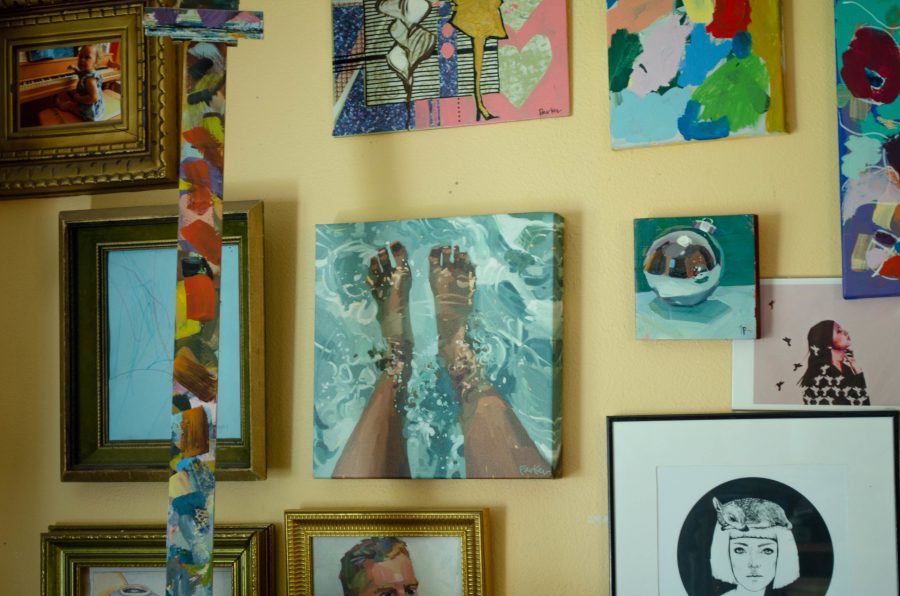 Parkers studio walls are covered with paintings. (Reed Slater | Collegian)