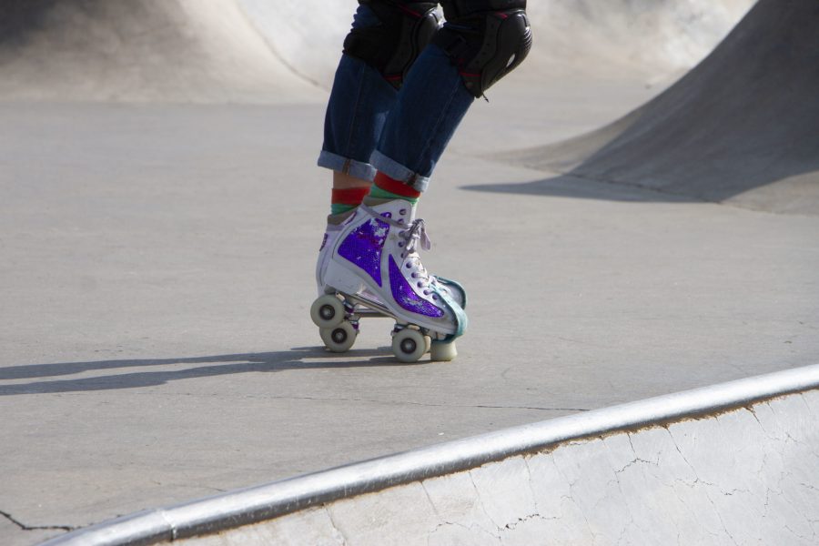 Kinna Harkins pauses for a breath at Northside Aztlan Community Center skate park