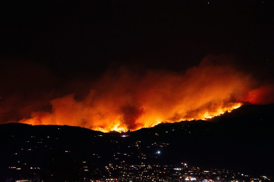 The Cameron Peak fire burns across the ridge above Glen Haven, Colorado, Oct. 16. (Matt Tackett | The Collegian)