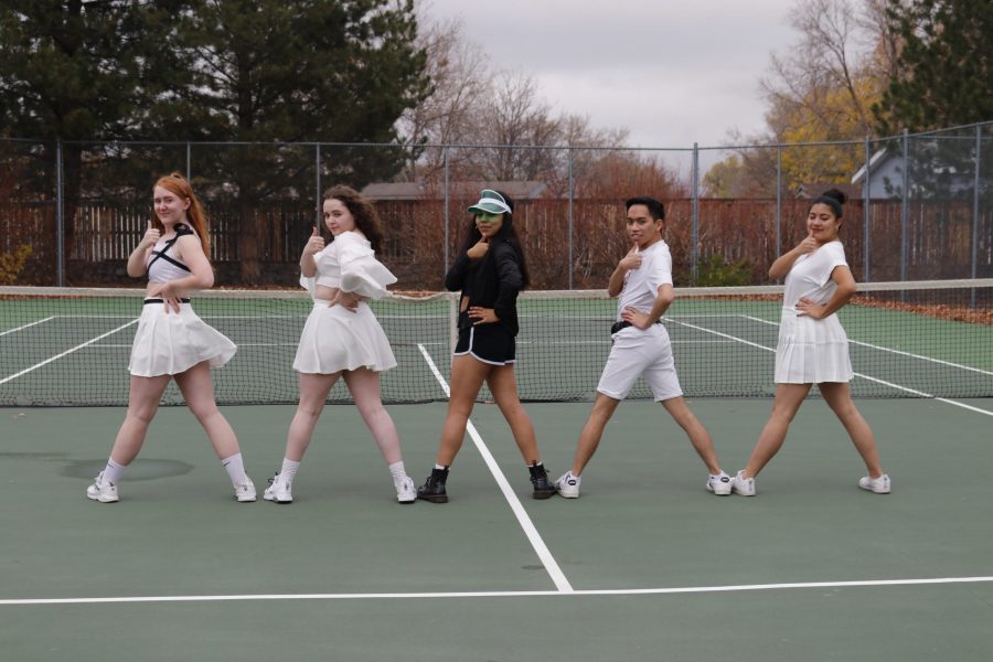 Colorado State University Korean Dance Club members turn to pose at the end of their filmed performance at Rams Pointe tennis court Oct. 18. The year-old club made its filmed performance debut last week and plans on continuing to film its performances. (Anna von Pechmann | The Collegian) 