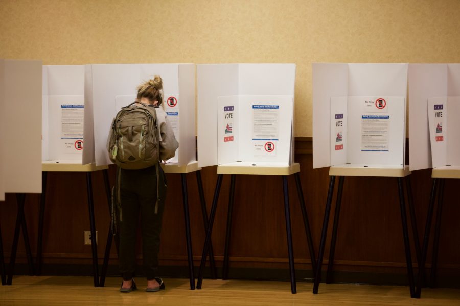 A voter in a voter service and polling center in the Lory Student Center Nov. 3. In addition to an important presidential election, voters had the opportunity to vote on many other issues, including a Senate race and numerous state policies. (Ryan Schmidt | The Collegian)