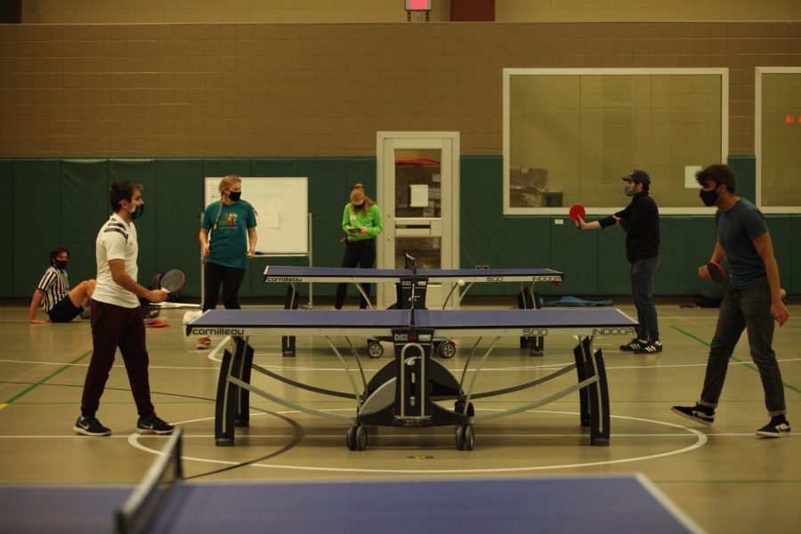 Students play intramural table tennis in MAC Gym Nov. 12. Participants noted that this tournament was a great way to get out and still do something active during the COVID-19 pandemic. (Ryan Schmidt | The Collegian)