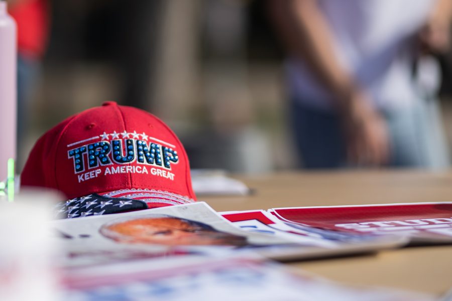 A Donald Trump hat on the Students for Trump Table Nov. 3. “We just think its super important students have a place to go who are anywhere right of center,” co-founder and Vice President Gabby Reichardt said. (Lucy Morantz | The Collegian)