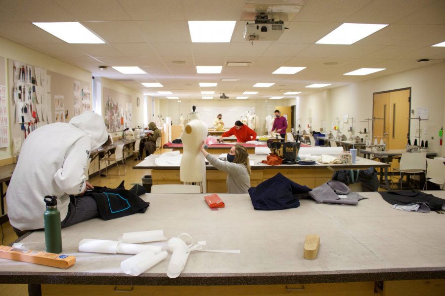 Colorado State University apparel and merchandising seniors work on their garments during their apparel design and production capstone class Nov. 11. (Anna von Pechmann | The Collegian)