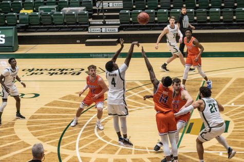Isaiah Stevens (4) shoots over a defender during the University’s basketball game vs Boise State University at Moby Arena Jan. 29. CSU loses 85-77. (Devin Cornelius | Collegian)
