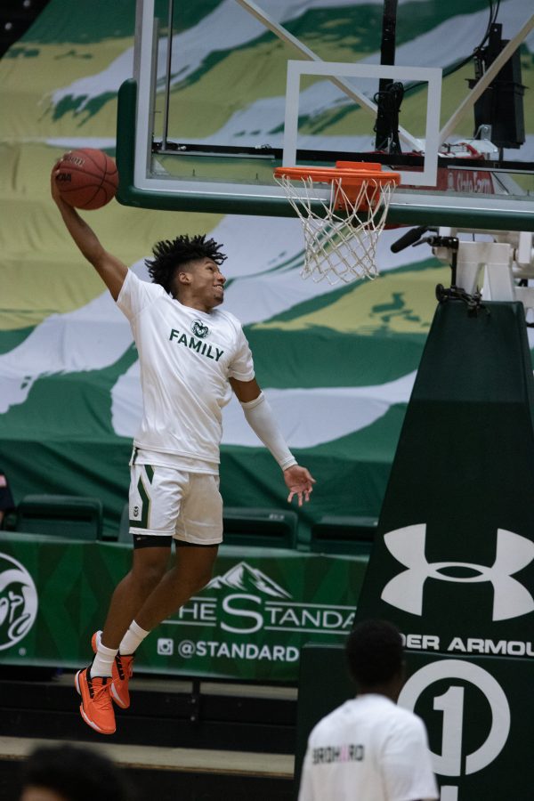 P.J. Byrd dunks while warming up for the University’s game against Boise State University Jan. 29. CSU loses to Boise 85-77. (Devin Cornelius | Collegian)