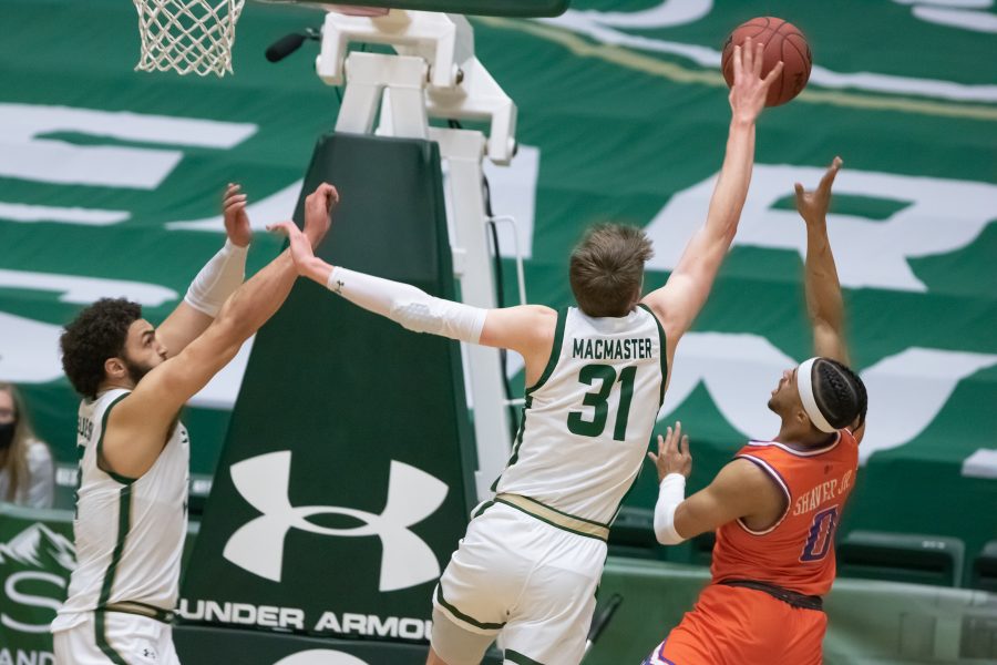 Adam Thistlewood (31) and David Roddy (21) block an opponent’s shot during the University’s basketball game vs Boise State University Jan. 29. CSU falls to Boise 85-77. (Devin Cornelius | Collegian) 