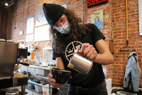 Executive director of Everyday Joe's Coffee House makes coffee