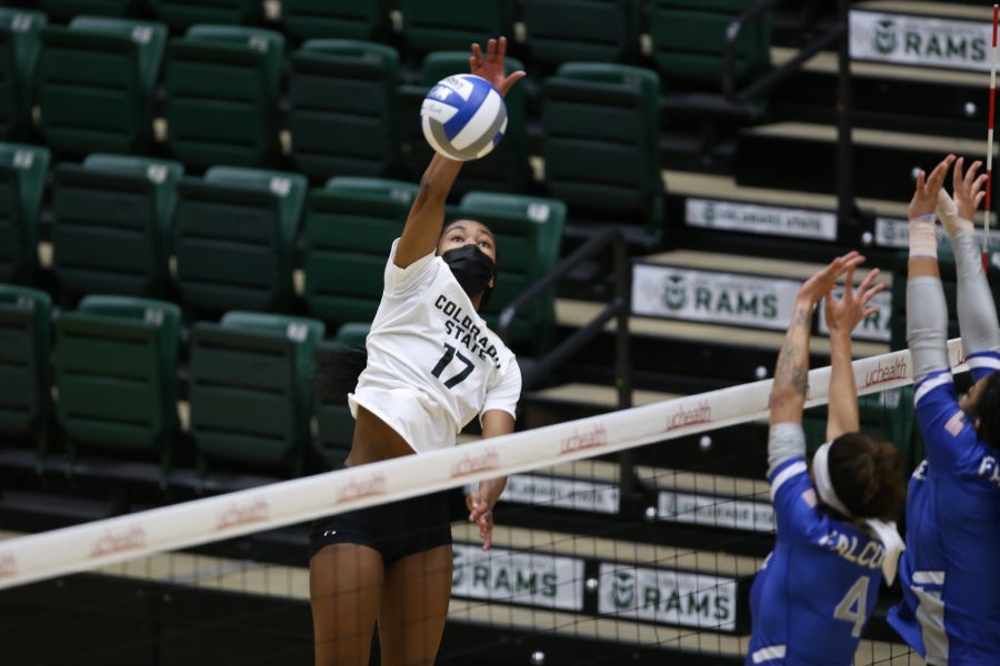 Kennedy Stanford (17) spikes against the Air Force Academy. (Luke Bourland | The Collegian)
