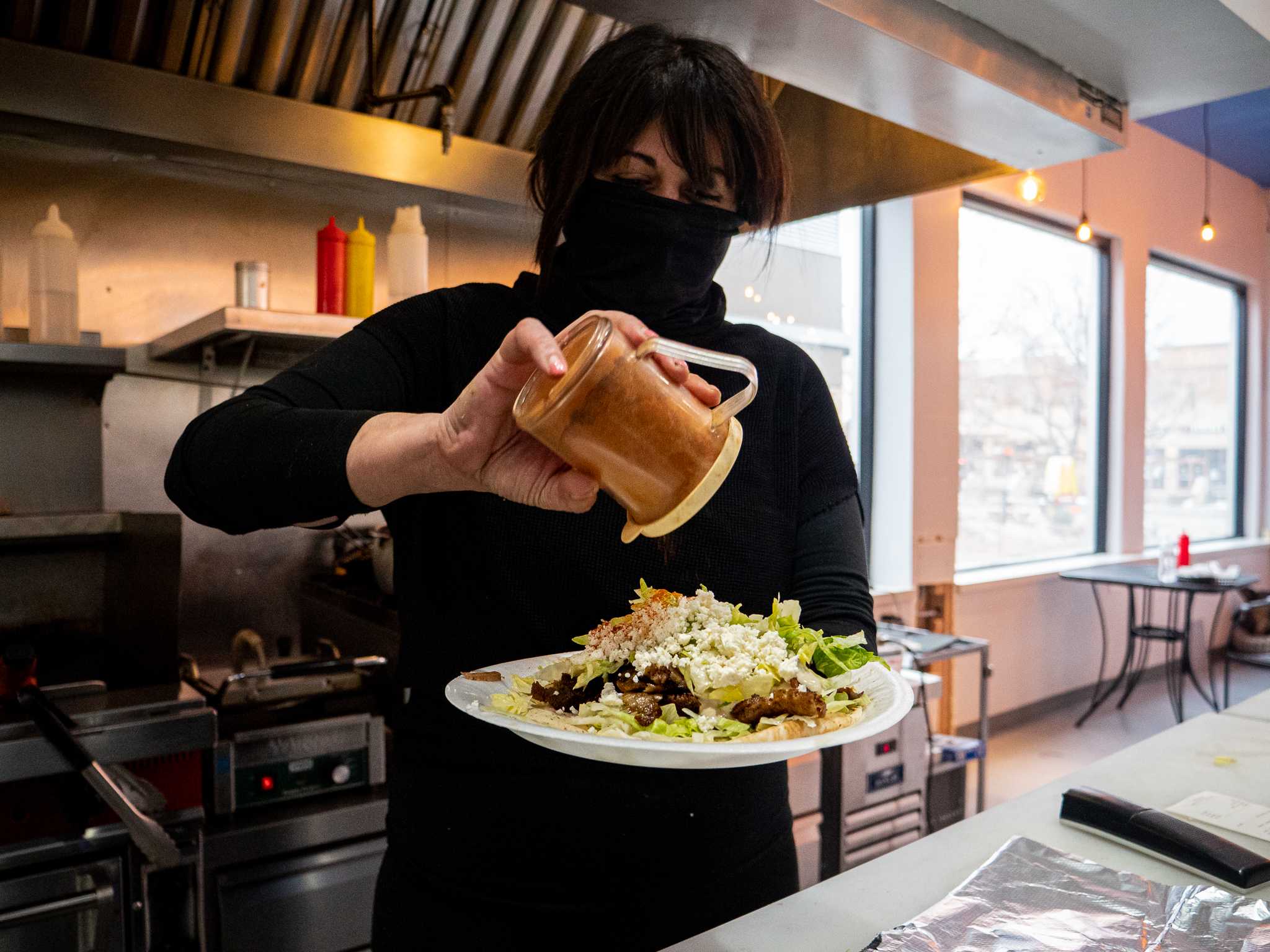 Denise Hakim prepping food