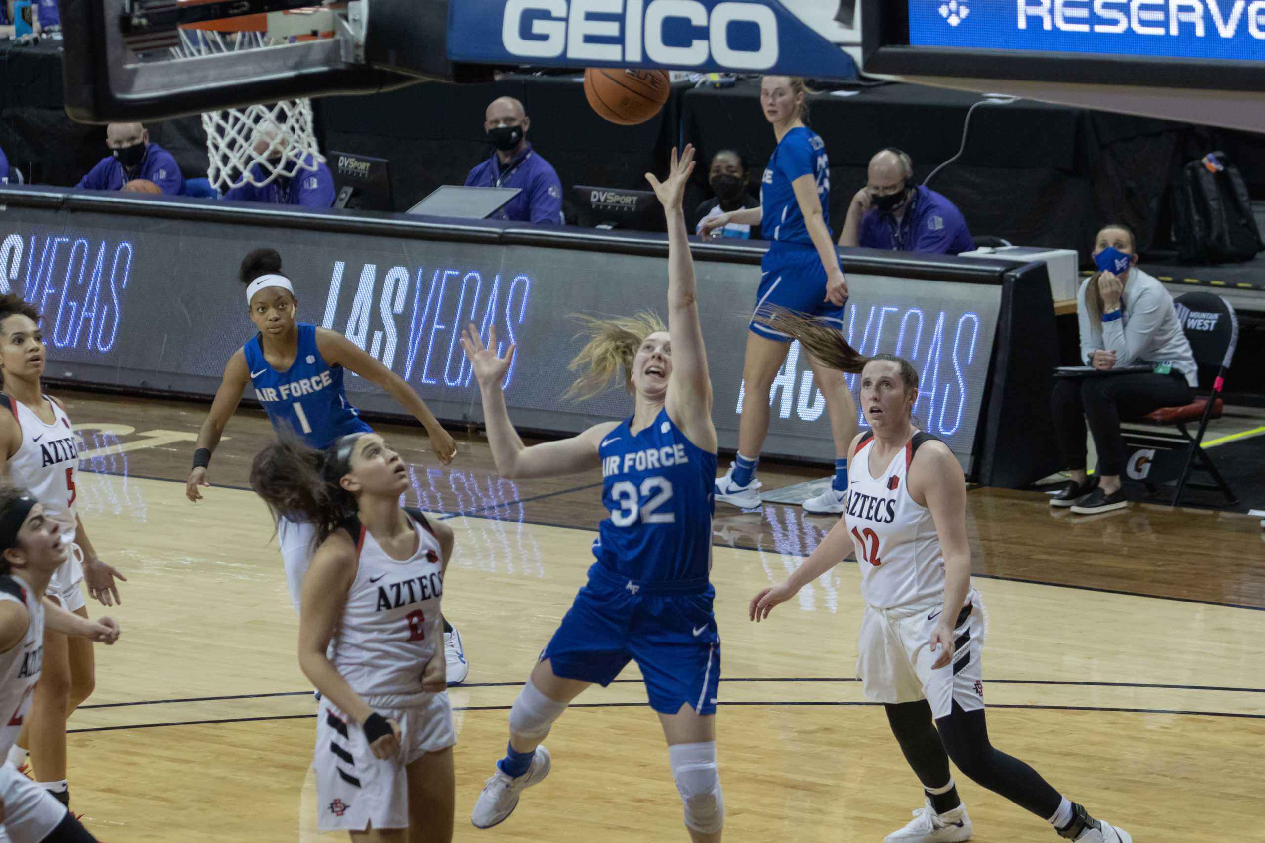 Kaelin Immel Drives past a defender towards the basket