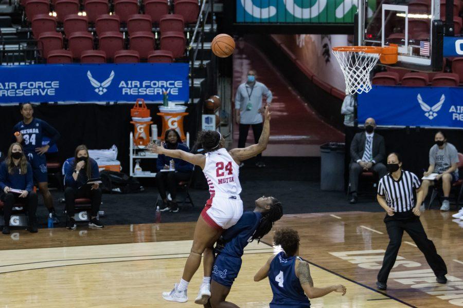 Wytalla Motta (24) attempts to make a jump shot after a fast break and receives and offensive foul, during the Air Force Reserve Mountain West Women's basketball tournament Mar. 8. California State University Fresno defeats Nevada 70-46. (Devin Cornelius | Collegian)