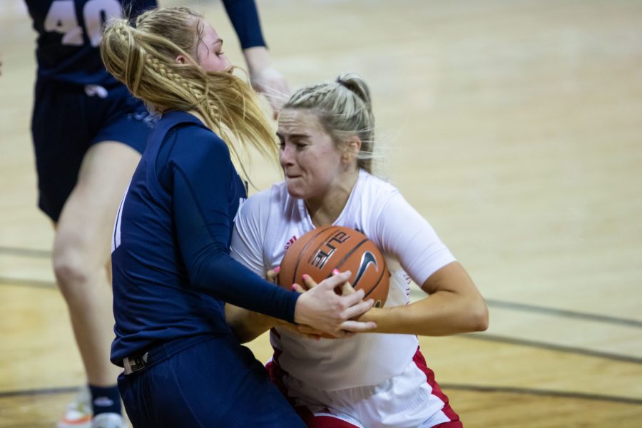 Hannah Cavinder (0) drives hard through a defender towards the basket, during the Air Force Reserve Mountain West Women's basketball tournament Mar. 8. California State University Fresno defeats Nevada 70-46. (Devin Cornelius | Collegian)
