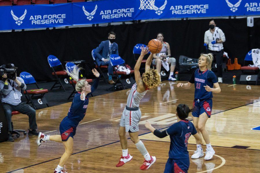 LaTora Duff (5) shoots a layup after a fast break, during the Air Force Reserve Mountain West Women's basketball tournament Mar. 9. California State University Fresno upset the New Mexico 77-72. (Devin Cornelius | Collegian) 