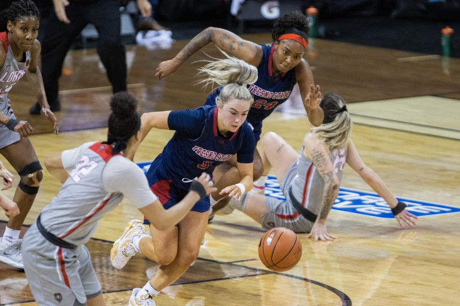 Haley Cavinder (0) powers down the court after a steal, during the Air Force Reserve Mountain West Women's basketball tournament Mar. 9. California State University Fresno upset the New Mexico 77-72. (Devin Cornelius | Collegian) 